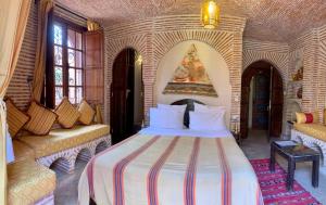 Postel nebo postele na pokoji v ubytování Riad Mazal + 37 fotografií