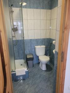 Kúpeľňa v ubytovaní Dom Wypoczynkowy Jędruś