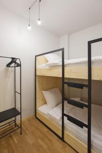 Ένα ή περισσότερα κρεβάτια σε δωμάτιο στο Apartament Husarski - City Park