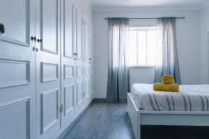 Ένα ή περισσότερα κρεβάτια σε δωμάτιο στο Apartment with 5 bedrooms