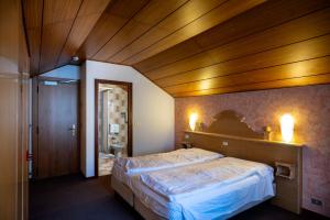 Posteľ alebo postele v izbe v ubytovaní Hotel Al Polo