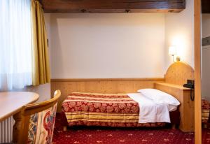 Posteľ alebo postele v izbe v ubytovaní Hotel Al Polo