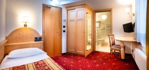 Posteľ alebo postele v izbe v ubytovaní Hotel Al Polo