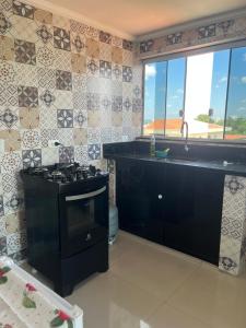 Kuchyň nebo kuchyňský kout v ubytování Casa 5 próximo ao autódromo