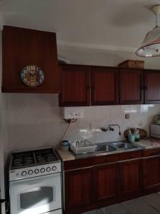 Η κουζίνα ή μικρή κουζίνα στο IP5 Chivas Beach House +7 φωτογραφίες