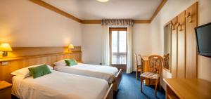 Posteľ alebo postele v izbe v ubytovaní Hotel Al Polo