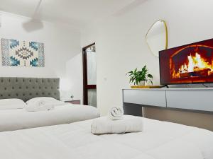 Postel nebo postele na pokoji v ubytování Tirana Square Hotel + 37 fotografií