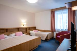 Posteľ alebo postele v izbe v ubytovaní Hotel Al Polo