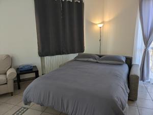 Postel nebo postele na pokoji v ubytování CAV Casa del vecchio faggio - 4 stelle - Nebbiuno Lago Maggiore