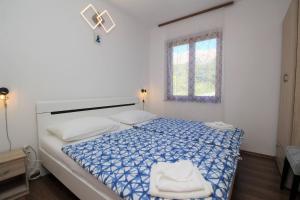 Posteľ alebo postele v izbe v ubytovaní Apartments Kucar