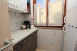 Kuchyňa alebo kuchynka v ubytovaní Apartments Kucar