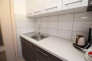 Kuchyňa alebo kuchynka v ubytovaní Apartments Kucar