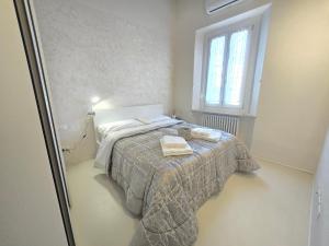 Posteľ alebo postele v izbe v ubytovaní Fabroniana Apartments