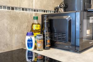 Kuchyň nebo kuchyňský kout v ubytování Le Jasmin - Netflix Inclus