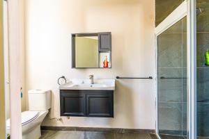a bathroom with a sink and a shower at Cape Town Milnerton Lagoon Villa in Cape Town +45 photos
