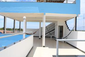 a view of the upper deck of a house with a swimming pool at Marujo da Gávea in Prado