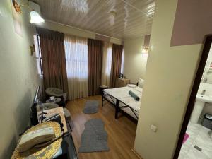 Ένα ή περισσότερα κρεβάτια σε δωμάτιο στο ALEM Hotel