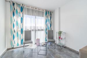 A seating area at Apart-rent Apartment Mimoses 0052