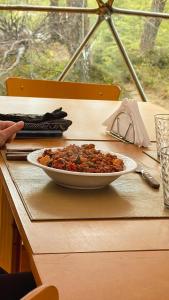 a bowl of food sitting on top of a table at FITZ CAMP - Glamping agreste - Base Cerro Fitz Roy in El Chalten
