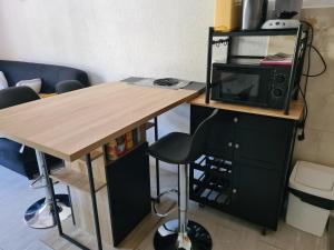 Kuchyň nebo kuchyňský kout v ubytování Agréable appartement-Résidence Le Panoramic + 6 fotografií