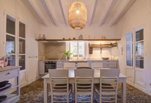 A kitchen or kitchenette at Finca Can Busquera by Rentallorca