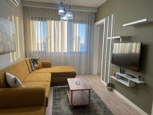TV a/nebo společenská místnost v ubytování Take Me Home