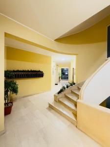 TV a/nebo společenská místnost v ubytování Suite Gennargentu Roma + 20 fotografií