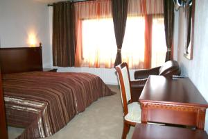 Postel nebo postele na pokoji v ubytování Guest House Chicho Tsane