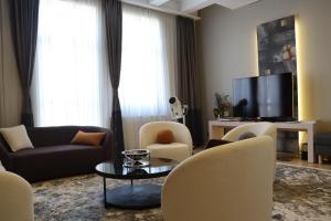 Una televisión o centro de entretenimiento en Zepter Hotel Belgrade, member of Zepter Hotels