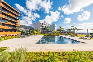 Bazén v ubytování City View Condo nebo v jeho okolí