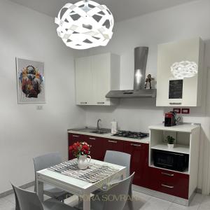 Kuchyň nebo kuchyňský kout v ubytování Dimora Sovrana- Gaming Rooms