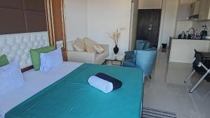 Postel nebo postele na pokoji v ubytování Zam Zam Holidays