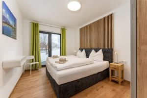 Postel nebo postele na pokoji v ubytování Chalet Reiteralm- mit Sommercard