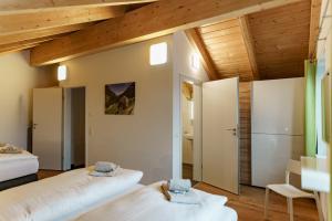 Postel nebo postele na pokoji v ubytování Chalet Reiteralm- mit Sommercard