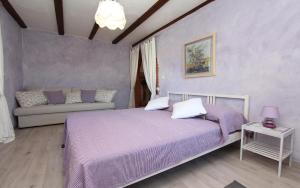 Posteľ alebo postele v izbe v ubytovaní Apartments Midea 2 + 37 fotografií