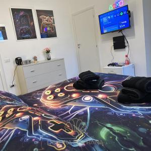 TV a/nebo společenská místnost v ubytování Dimora Sovrana- Gaming Rooms