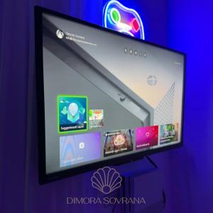 TV a/nebo společenská místnost v ubytování Dimora Sovrana- Gaming Rooms