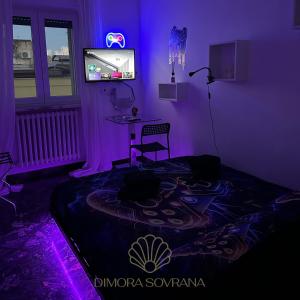 TV a/nebo společenská místnost v ubytování Dimora Sovrana- Gaming Rooms