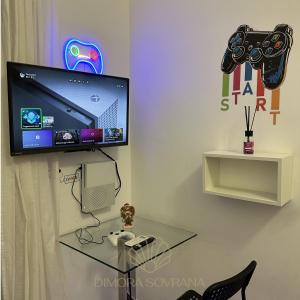 TV a/nebo společenská místnost v ubytování Dimora Sovrana- Gaming Rooms