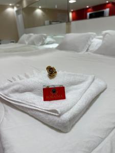 Krevet ili kreveti u jedinici u okviru objekta Roraima Apart Hotel