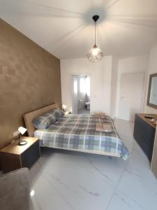 Katil atau katil-katil dalam bilik di Il-Girna- Modern Seaside Accommodation