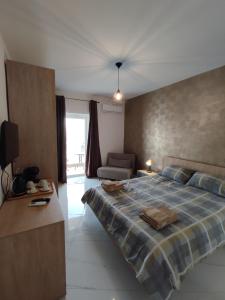 Katil atau katil-katil dalam bilik di Il-Girna- Modern Seaside Accommodation