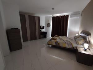 Katil atau katil-katil dalam bilik di Il-Girna- Modern Seaside Accommodation