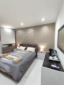 Katil atau katil-katil dalam bilik di Il-Girna- Modern Seaside Accommodation