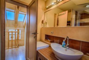 A bathroom at Vila Studienka Még 37 kép