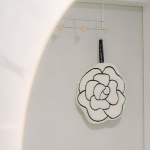 a computer mouse ornament hanging on a wall at Noddle Sun Stay in Seoul