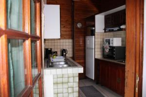 Kuchyň nebo kuchyňský kout v ubytování L'Habitation Firmant
