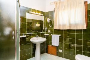 Kúpeľňa v ubytovaní Hotel Piccolo Pevero