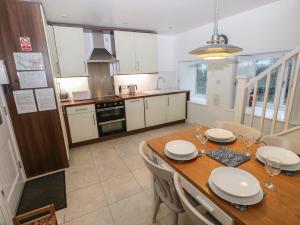 Køkken eller tekøkken på Wood Cottage