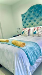 Ένα ή περισσότερα κρεβάτια σε δωμάτιο στο Simla Luxury Apartments 9
